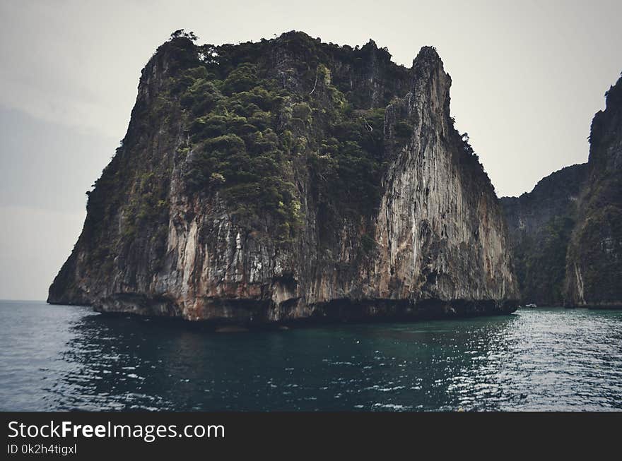 Mountains Near Body of Water