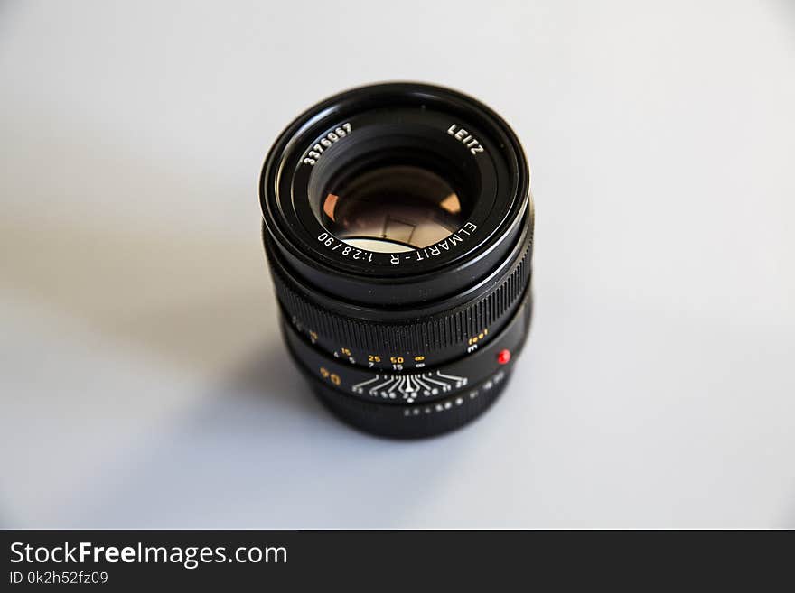 Photo of Black Zoom Lens on White Surface