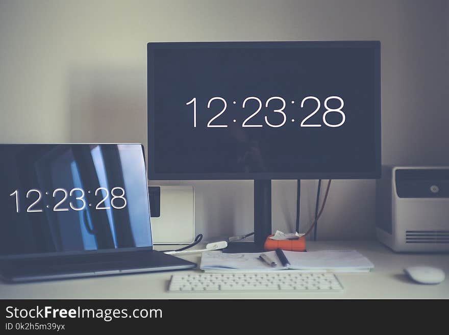 Monitor Displaying 12:23:28