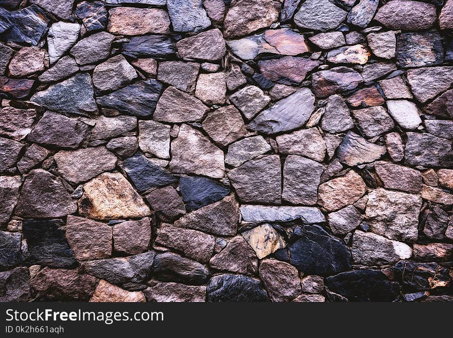 Grey and Brown Brick Wall