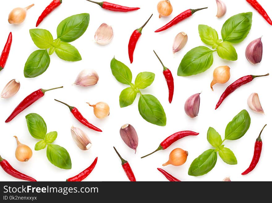 Basil And Garlic Isolated On White Background, Top View. Wallpaper Abstract Composition Of Vegetables.