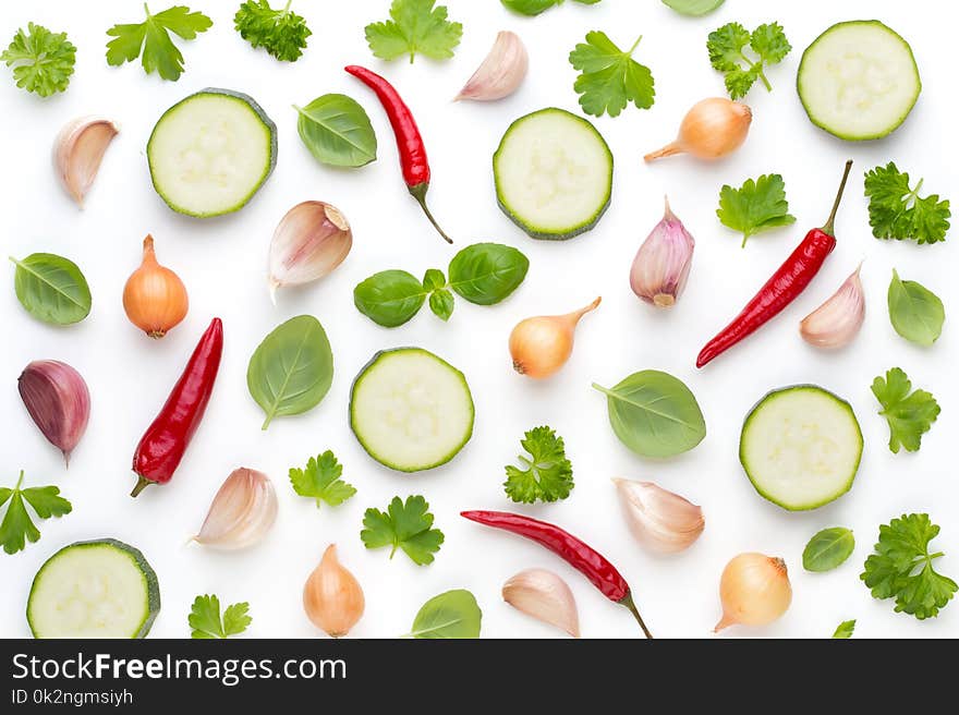 Vegetable and spices isolated on white background, top view. Flat lay. Vegetable and spices isolated on white background, top view. Flat lay.