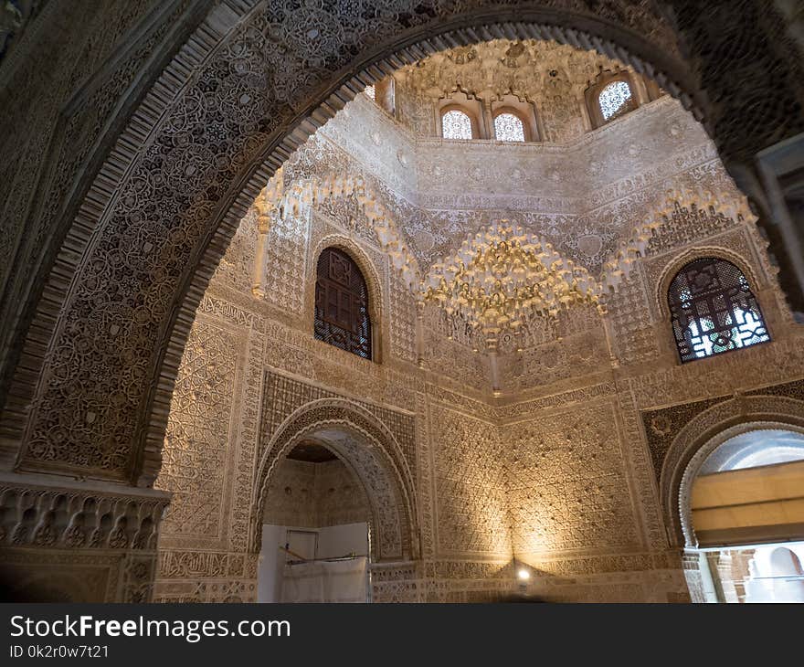 GRANADA, SPAIN - March 2018: Arches And Columns Of Alhambra. It Is A Palace And Fortress Complex Located In Granada.