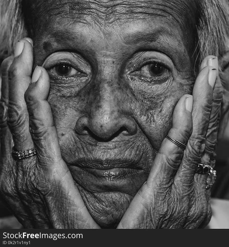 Lonely senior woman smiling in camera portrait sad depressed,emotion, feelings, thoughtful, senior, old woman,wait, gloomy, worried, covering her face, Human face expressions