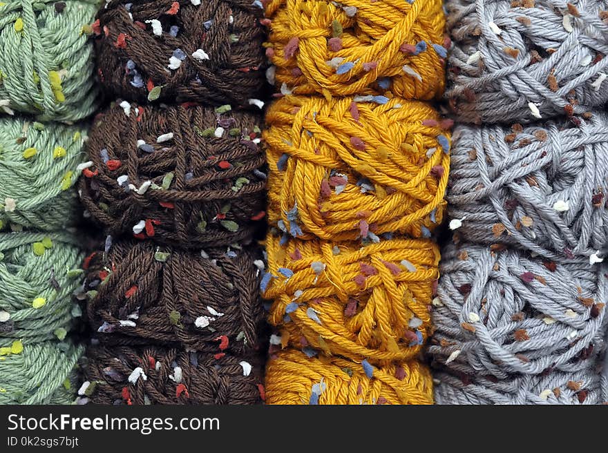 Colorful balls of wool, close up background