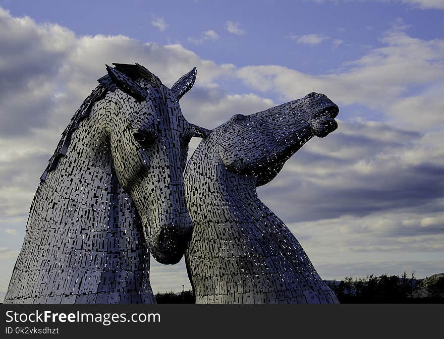 Two Gray Horse Statues