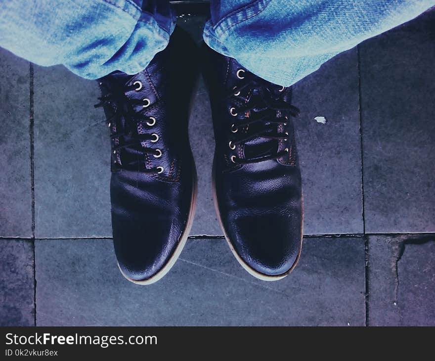 Photo of Man Wearing Black Leather Shoes