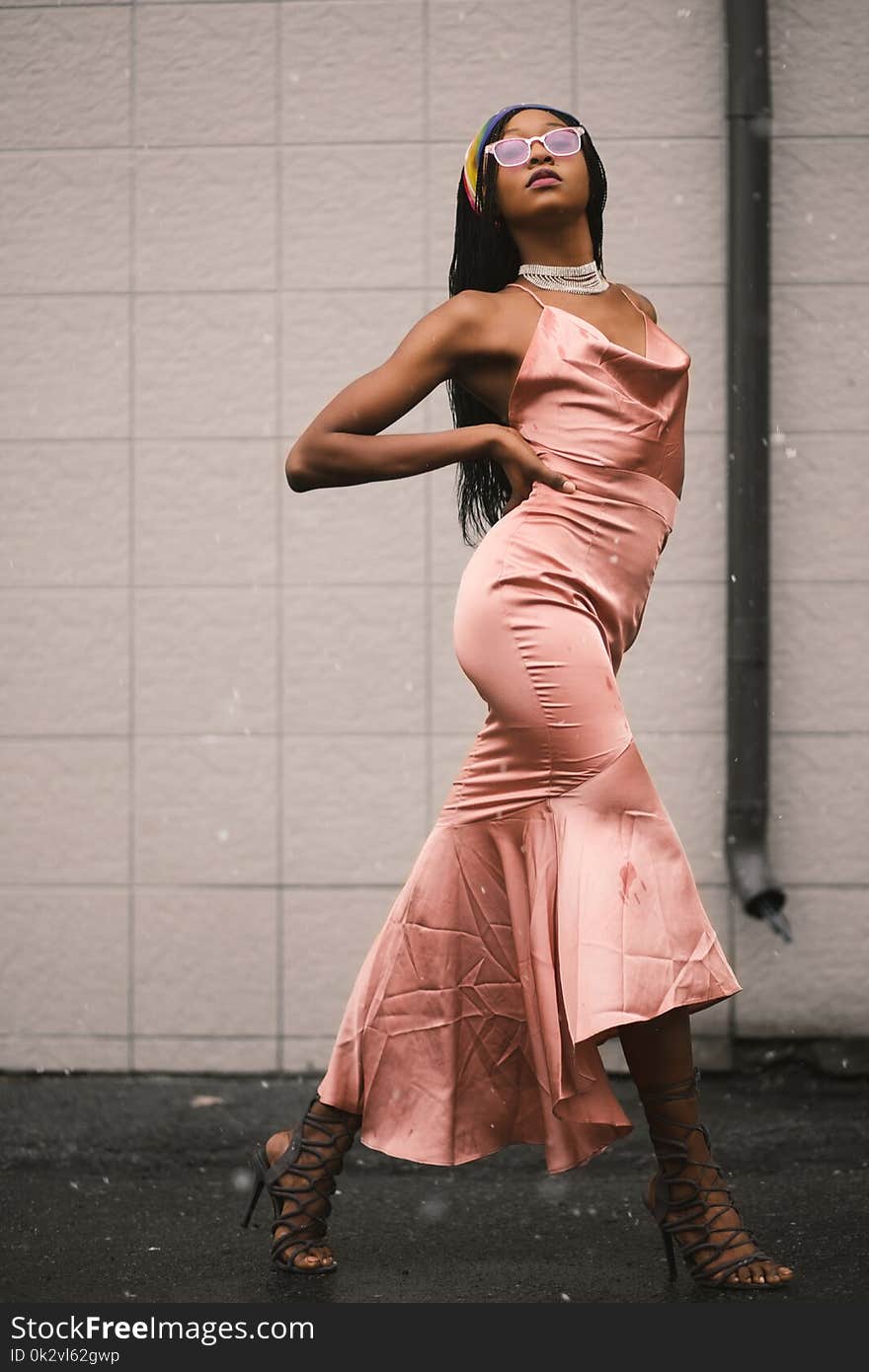 Woman in Pink Spaghetti Strap Dress