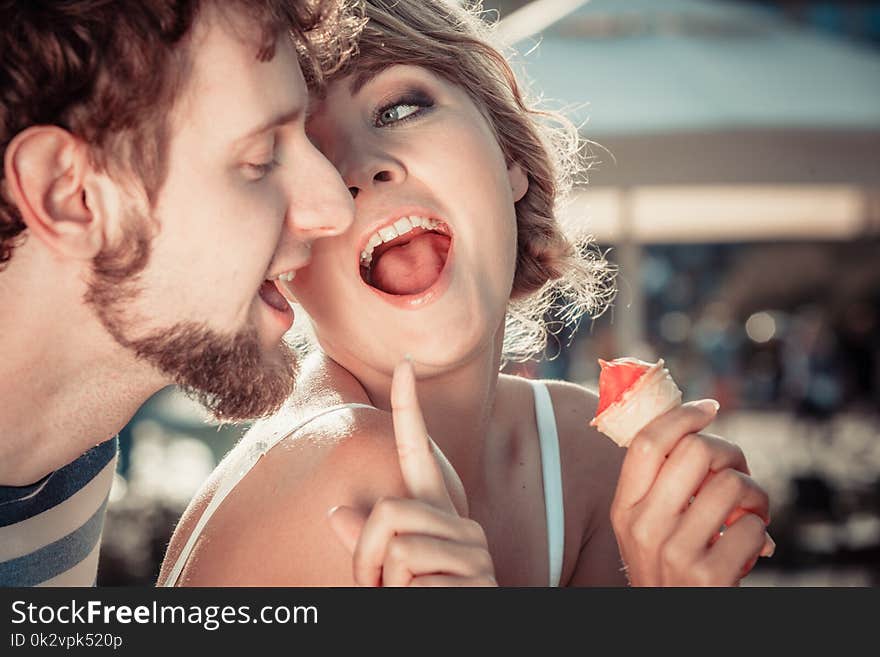 Young Couple Eating Ice Cream Outdoor