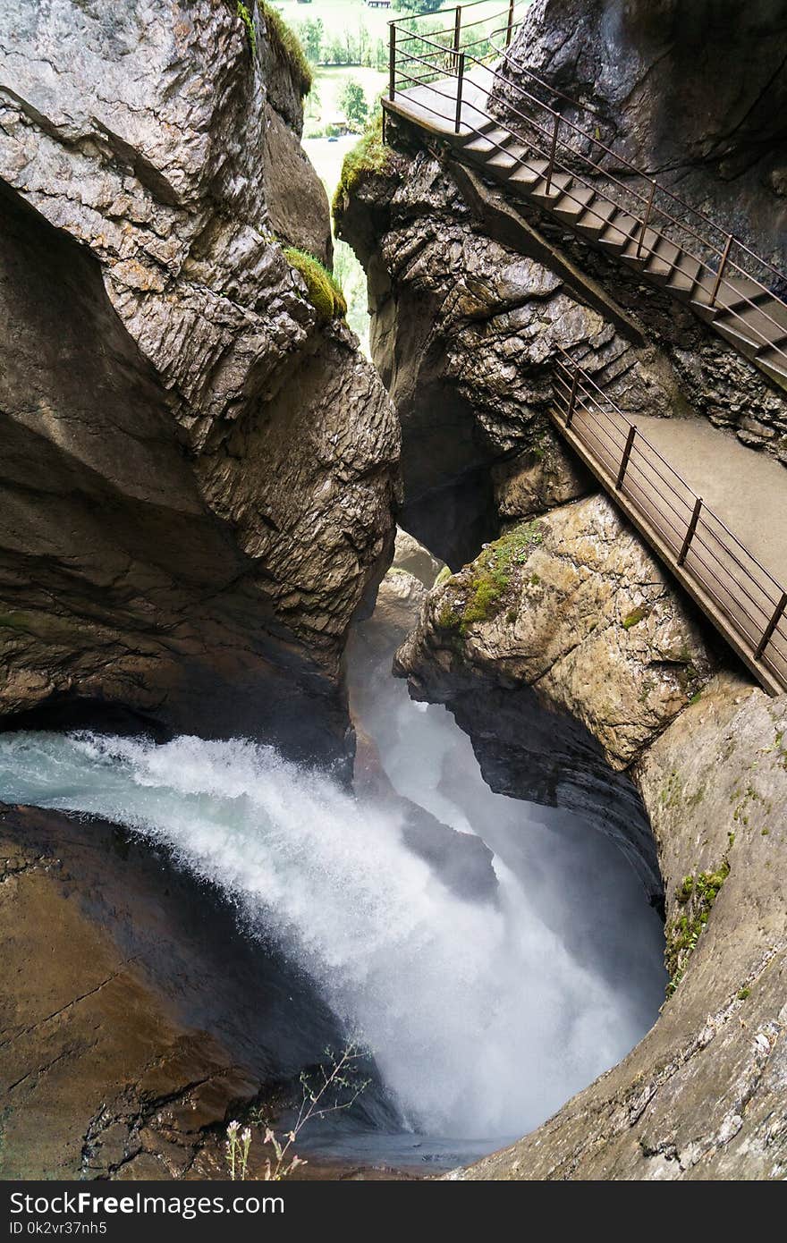 Huge waterfall stream in rocks. Trummelbachfalls waterfall in Lauterbrunnen, Switzerland.