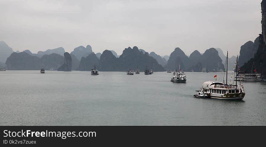 Boats sailing out on Halong Bay, in Vietnam