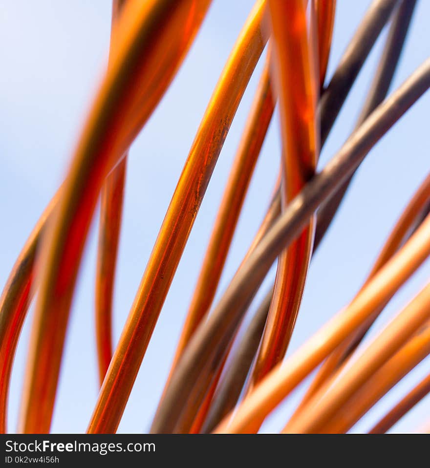 Copper wire against the blue sky