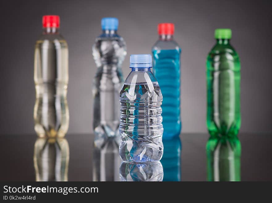 Plastic bottle on the blue background