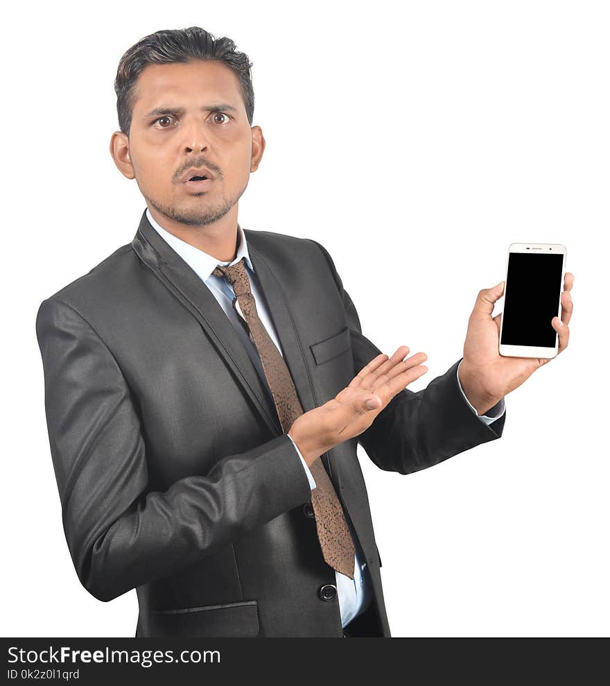 Man holding blank screen smartphone isolated on white background professionally