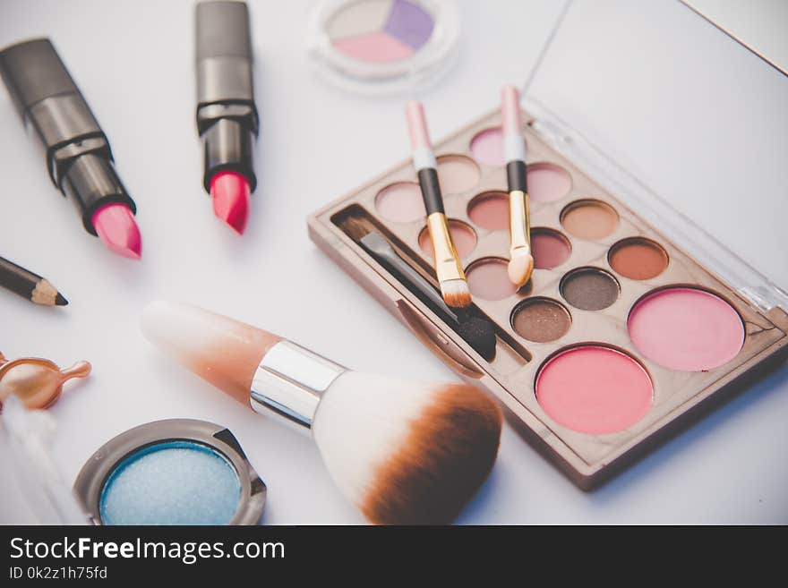 Set of decorative cosmetics for women on white background.