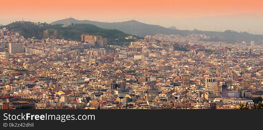 Barcelona Cityscape At Sunset.