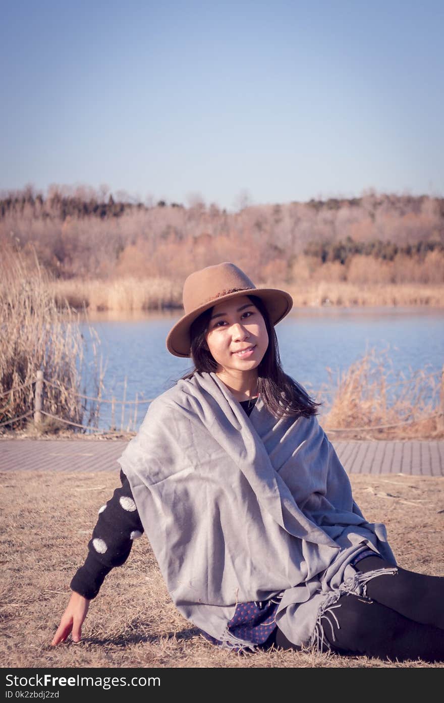 Portrait of a happy young lovely asian girl in the autumn. Portrait of a happy young lovely asian girl in the autumn