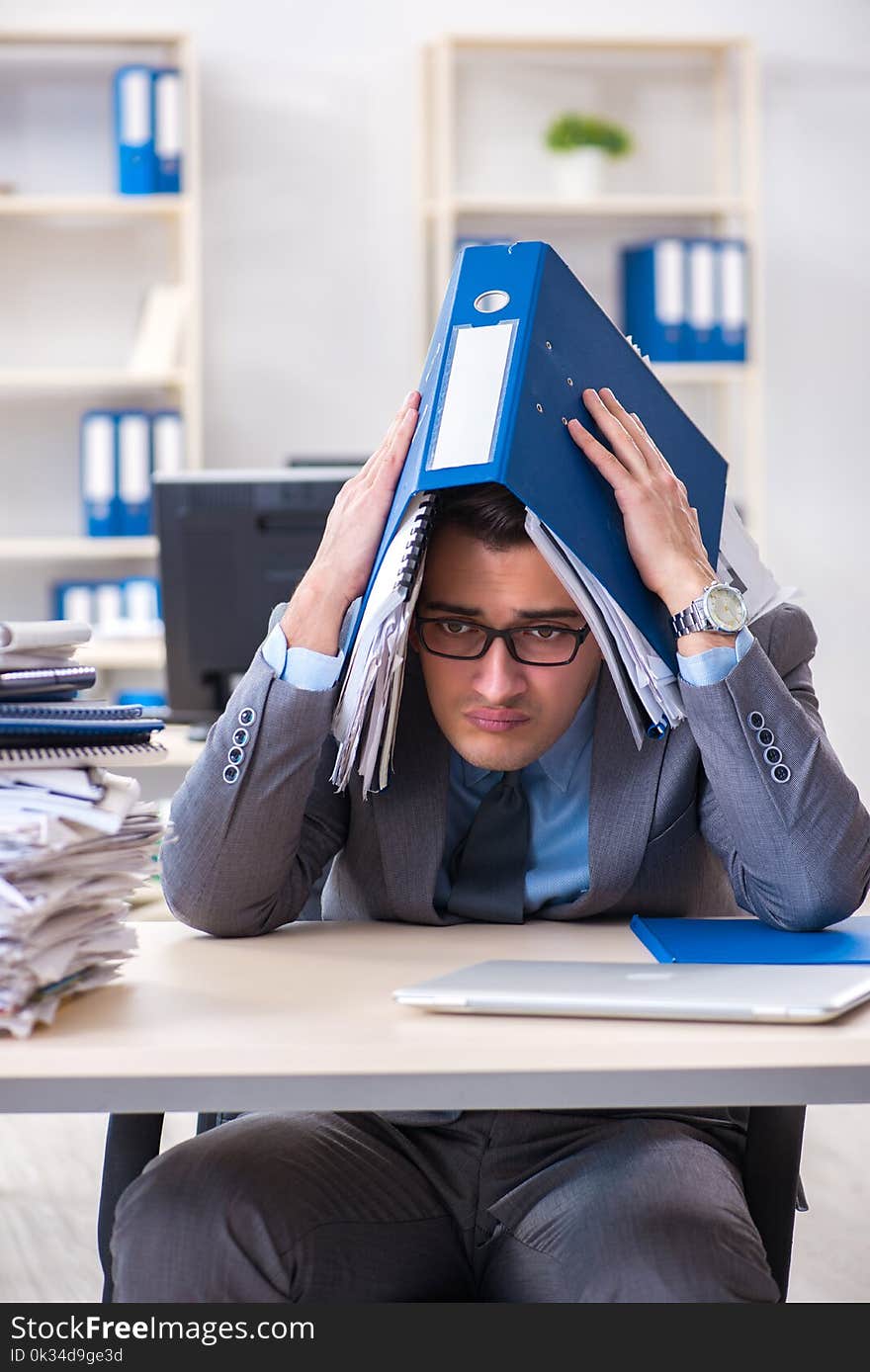 The Overloaded With Work Employee Under Paperwork Burden