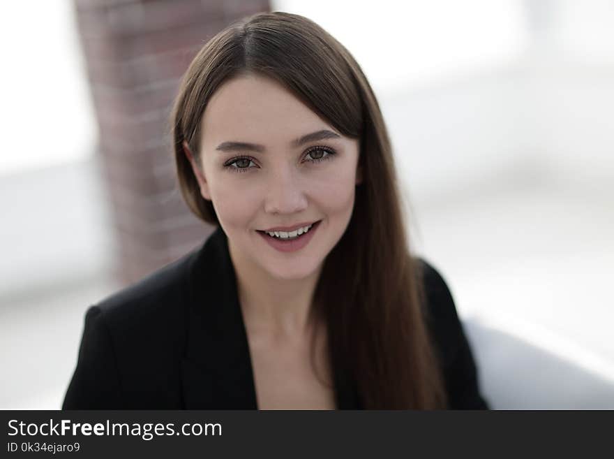 Face of beautiful woman on office background. Face of beautiful woman on office background