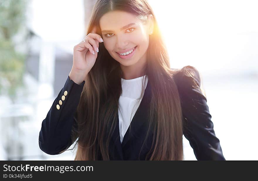 Closeup of young business woman on the background of the office