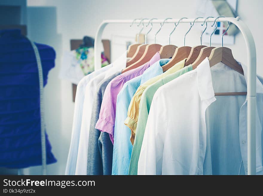 Clothing on hanger at the modern shop boutique