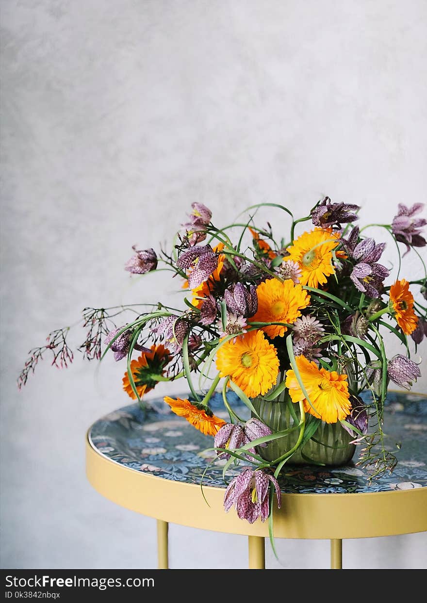 Potted Yellow and Purple Cluster Flowers