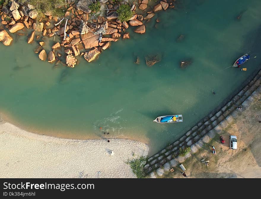 Aerial Photography of Boat Sailing