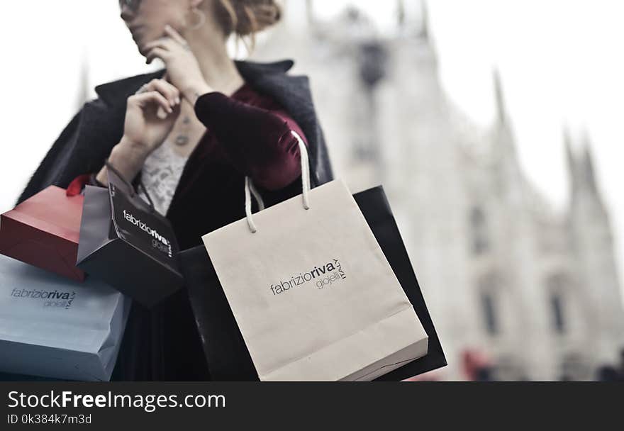 Woman Holding Shopping Bags