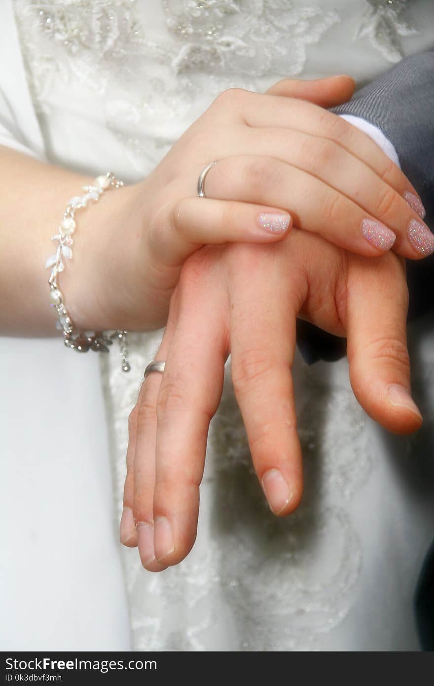 Hands With Wedding Rings