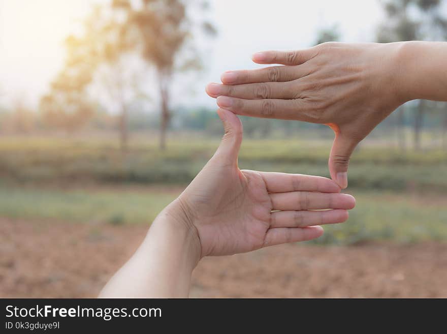 Close up of hands making frame gesture. Close up of woman hands