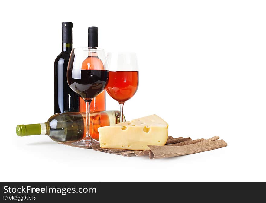 Wineglass, bottle of wine and cheese