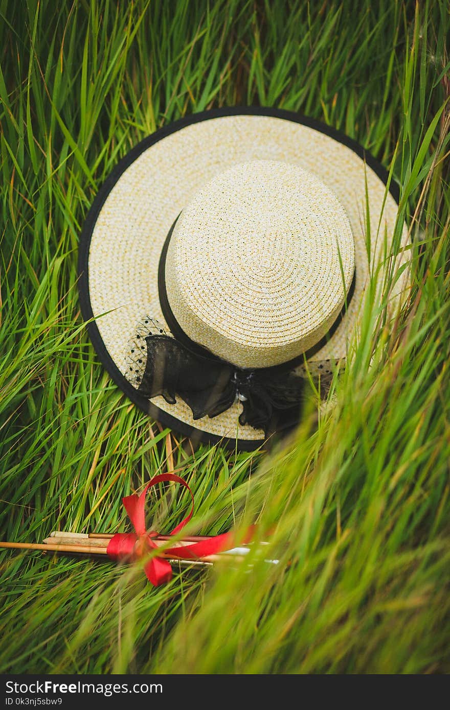 Beige and Black Wicker Hat