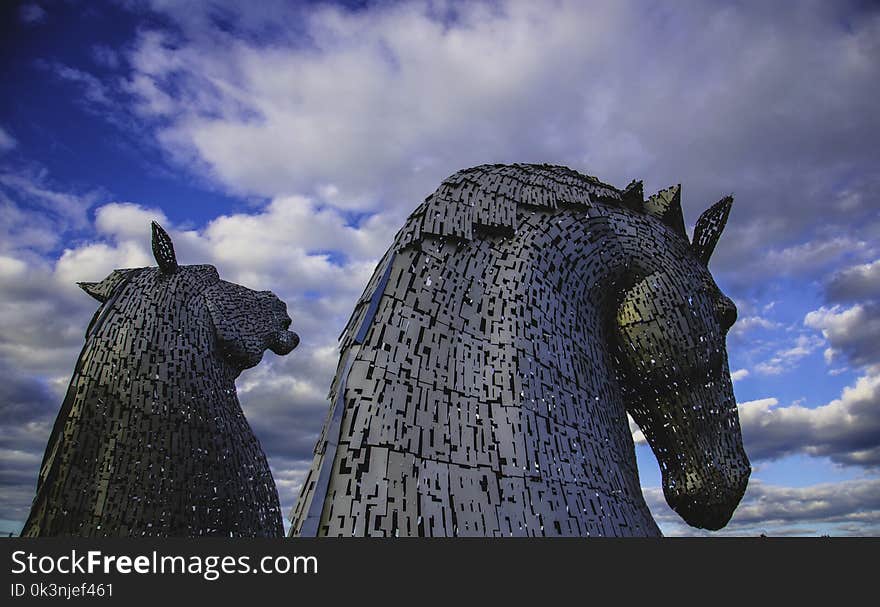 Photography of Two Silver Horse Statue