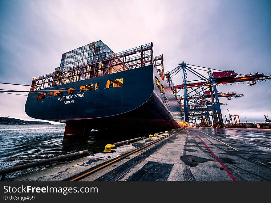 Black Sail Ship on Body of Water