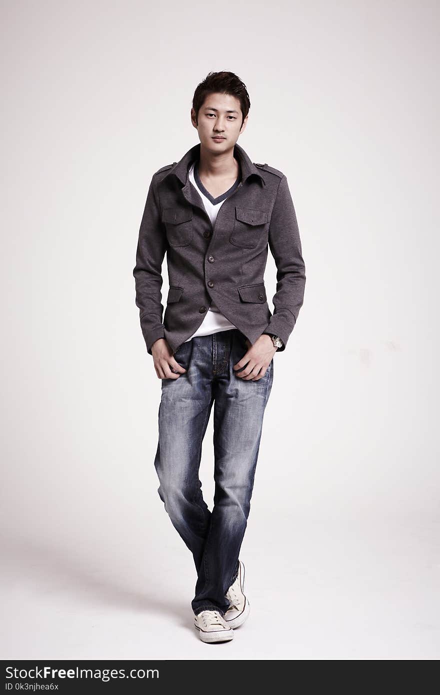 Man Wearing Blue Denim Pants