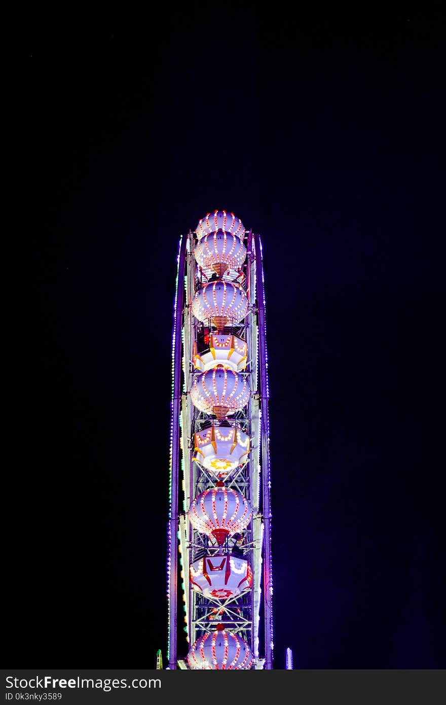 Illuminated Ferris Wheel at Night