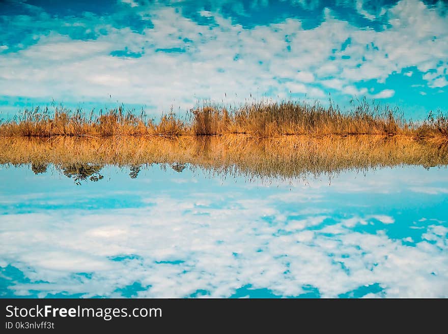 Landscape Photography of Sky Reflect to Body of Water