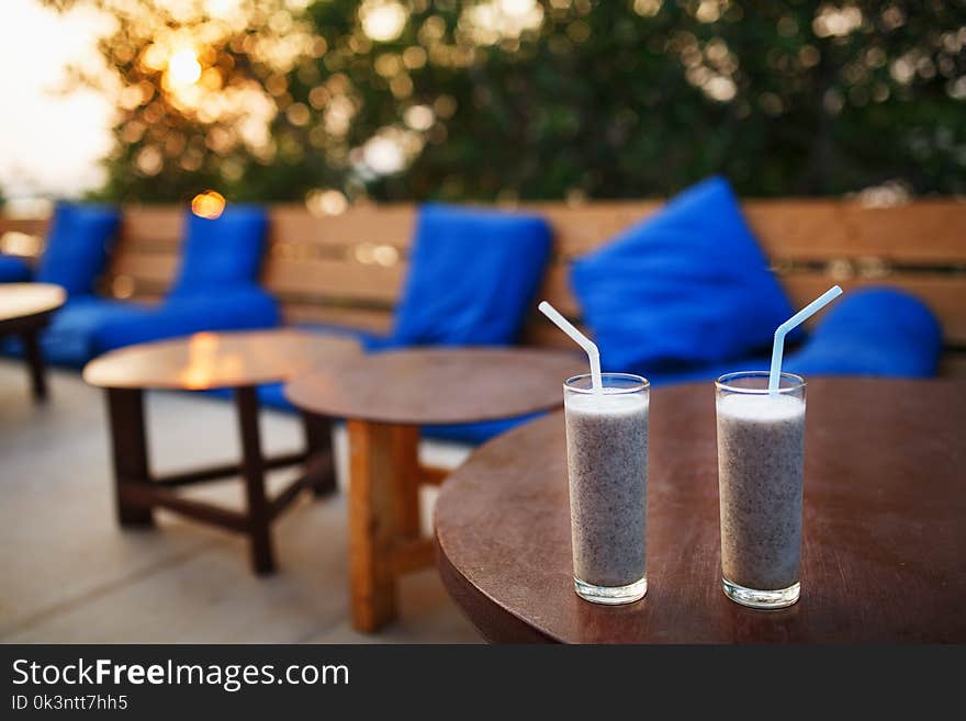 Cocktails on a sea front bar whilst the sun is setting