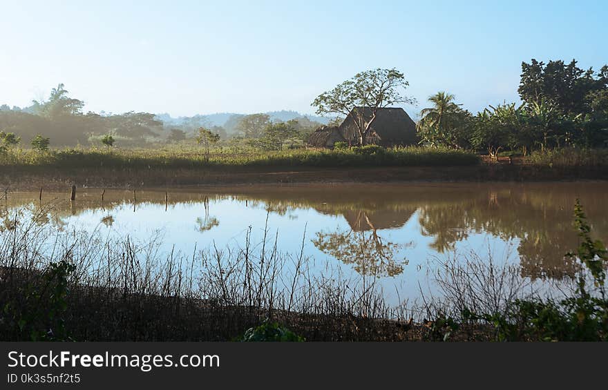 A Dryer for tobacco near a pond in the Vinales Valley