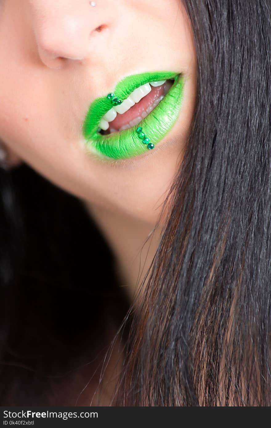 Photo of Woman in Green Lipstick