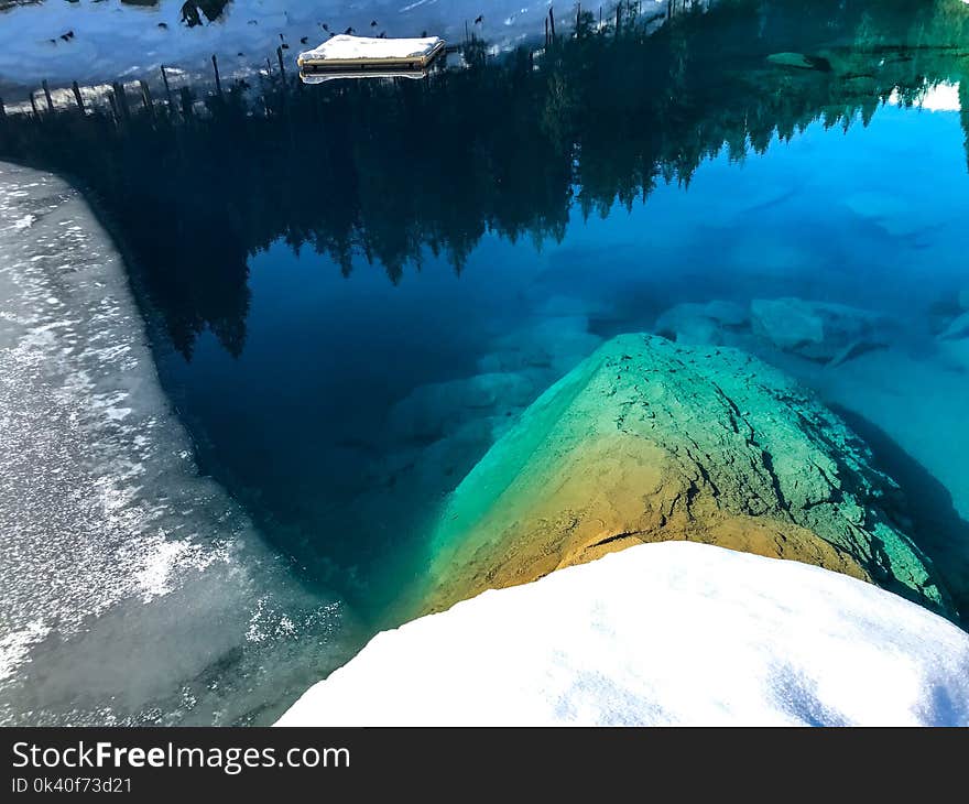 Reflection Of Trees on Body Of Water