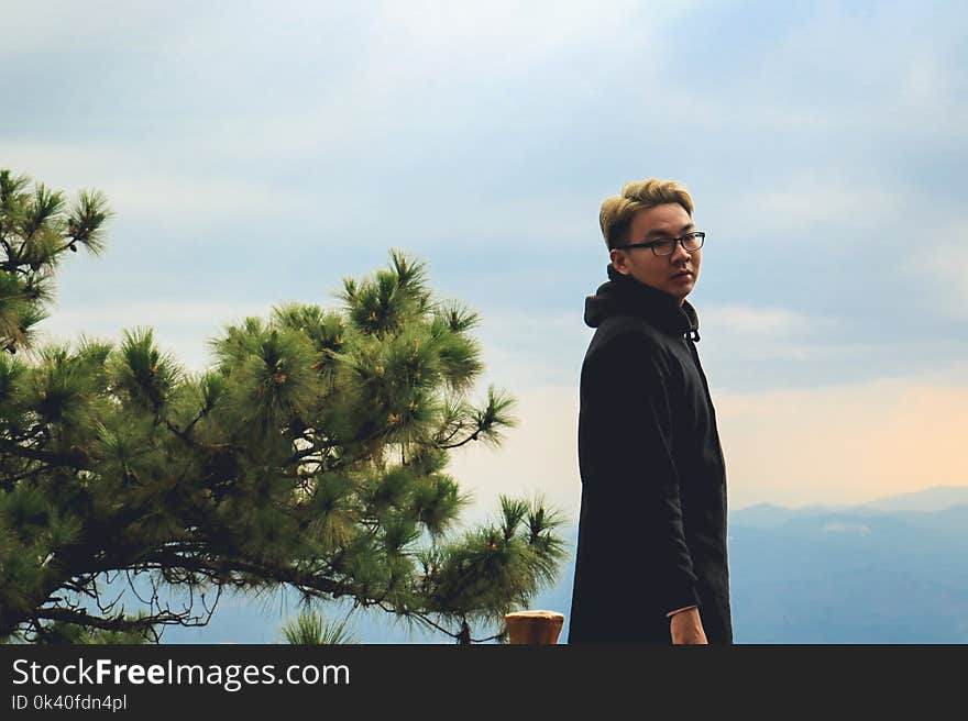 Photo of Man Wearing Black Coat