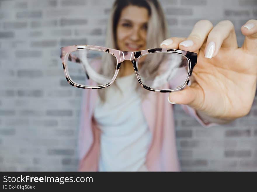 Selective Focus Photography of Pink and Black Framed Eyeglasses