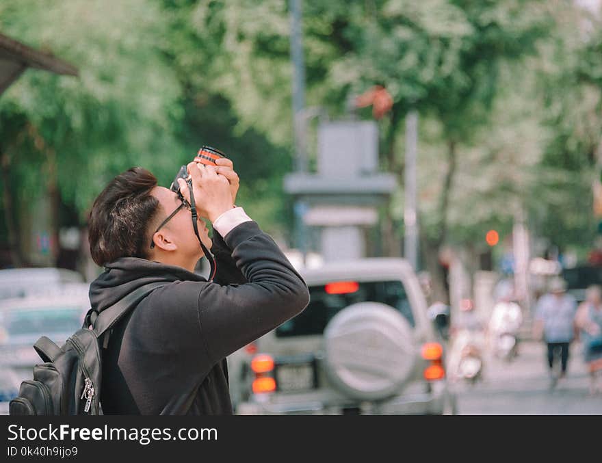 Man Taking Picture