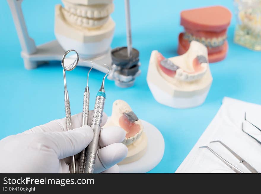 Dentist Tools And Prosthodontic Model.