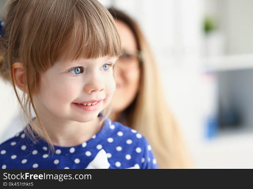 Little child with mother at pediatrician reception. Physical exam cute infant portrait baby aid healthy lifestyle ward round child sickness clinic test high quality and baby concept