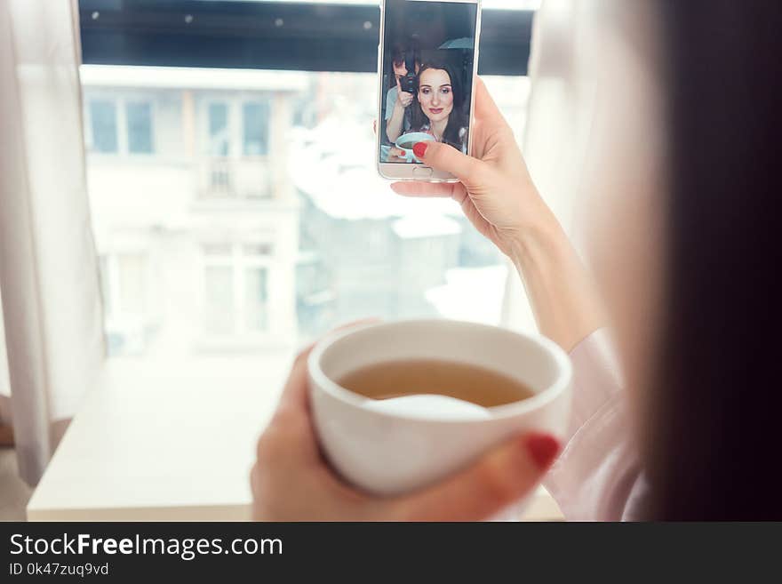 Woman Taking A Selfie Picture In Her Bedroom