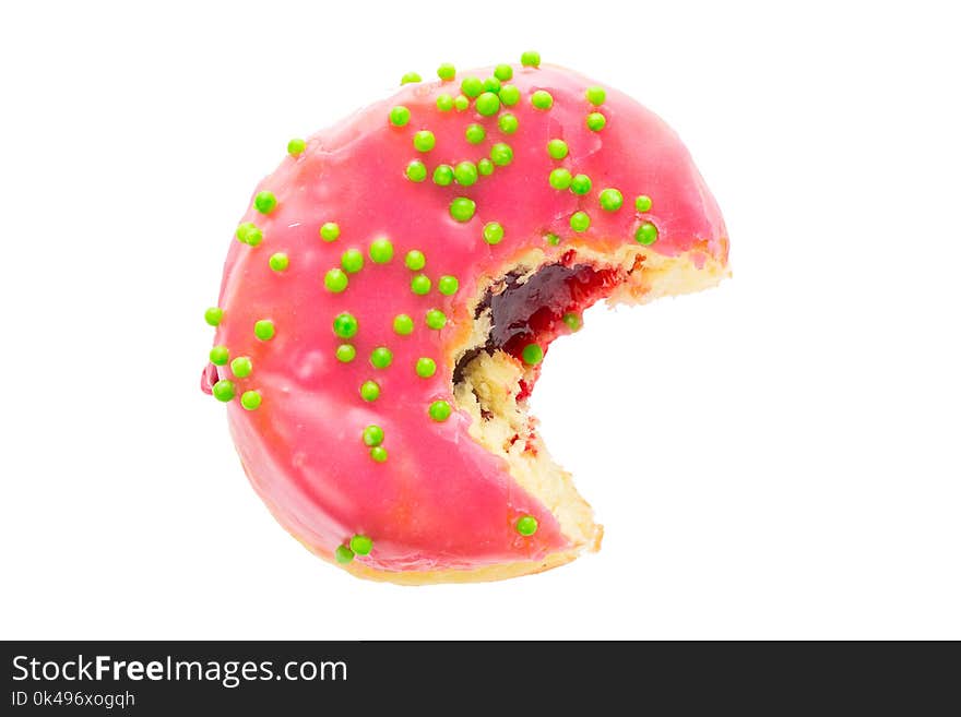 Bitten pink tasty donut isolated on white background.