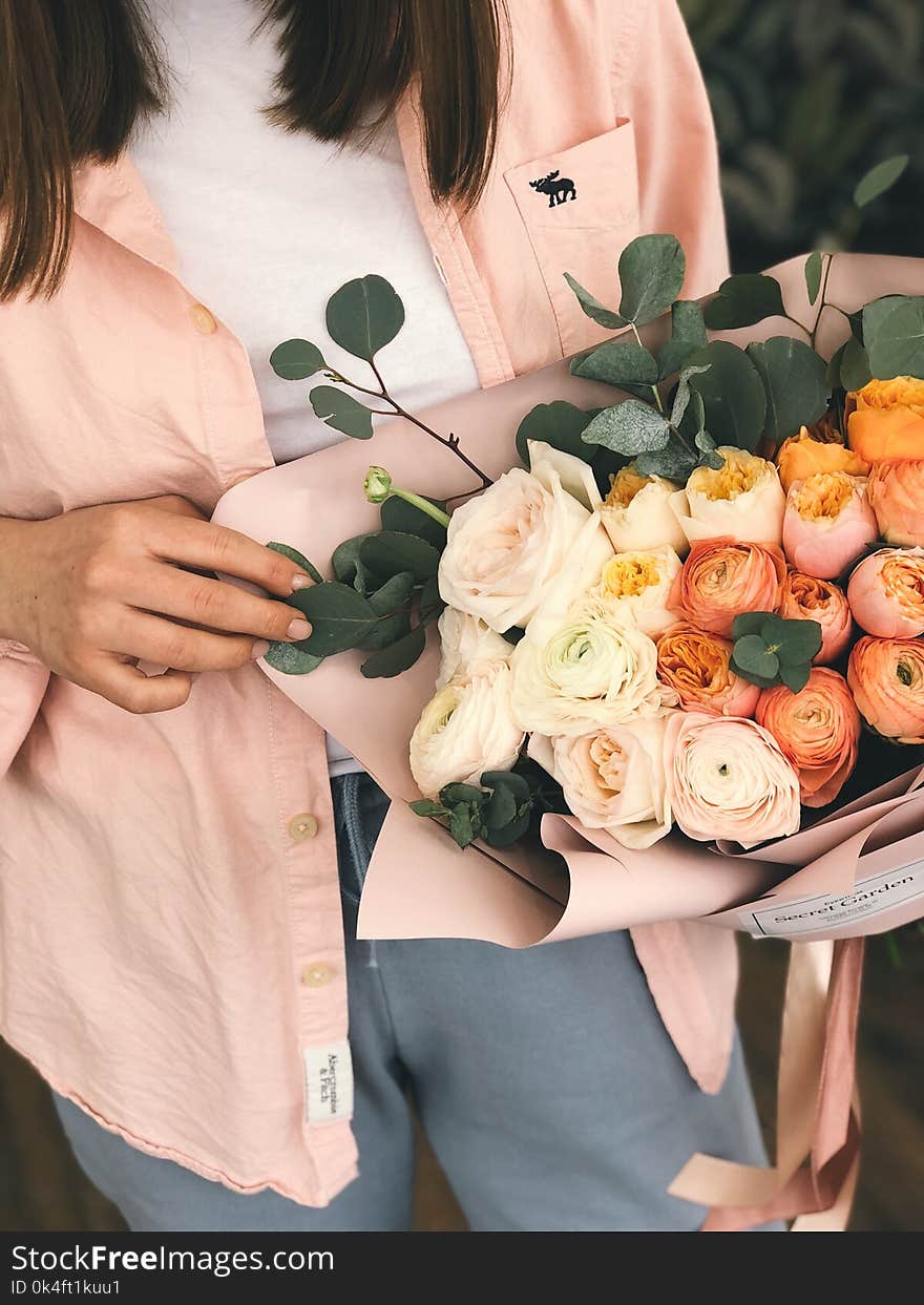 Person Holding Bouquet of Flower