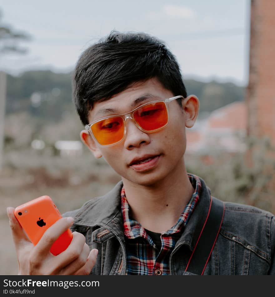 Man Wearing Blue Denim Jacket